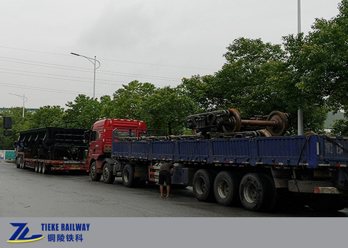 O baixo ar lateral tomado partido do carro da descarga do reator aberto que derruba a carga AAR do cilindro 60t aprovou