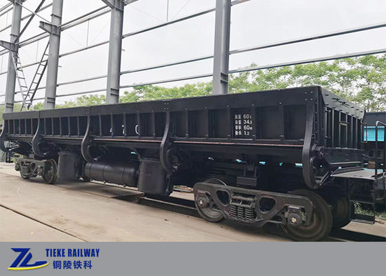 o carro de carvão do trem da descarga do lado do trilho da carga 60t agrega a escória de aço de pedra esmagada